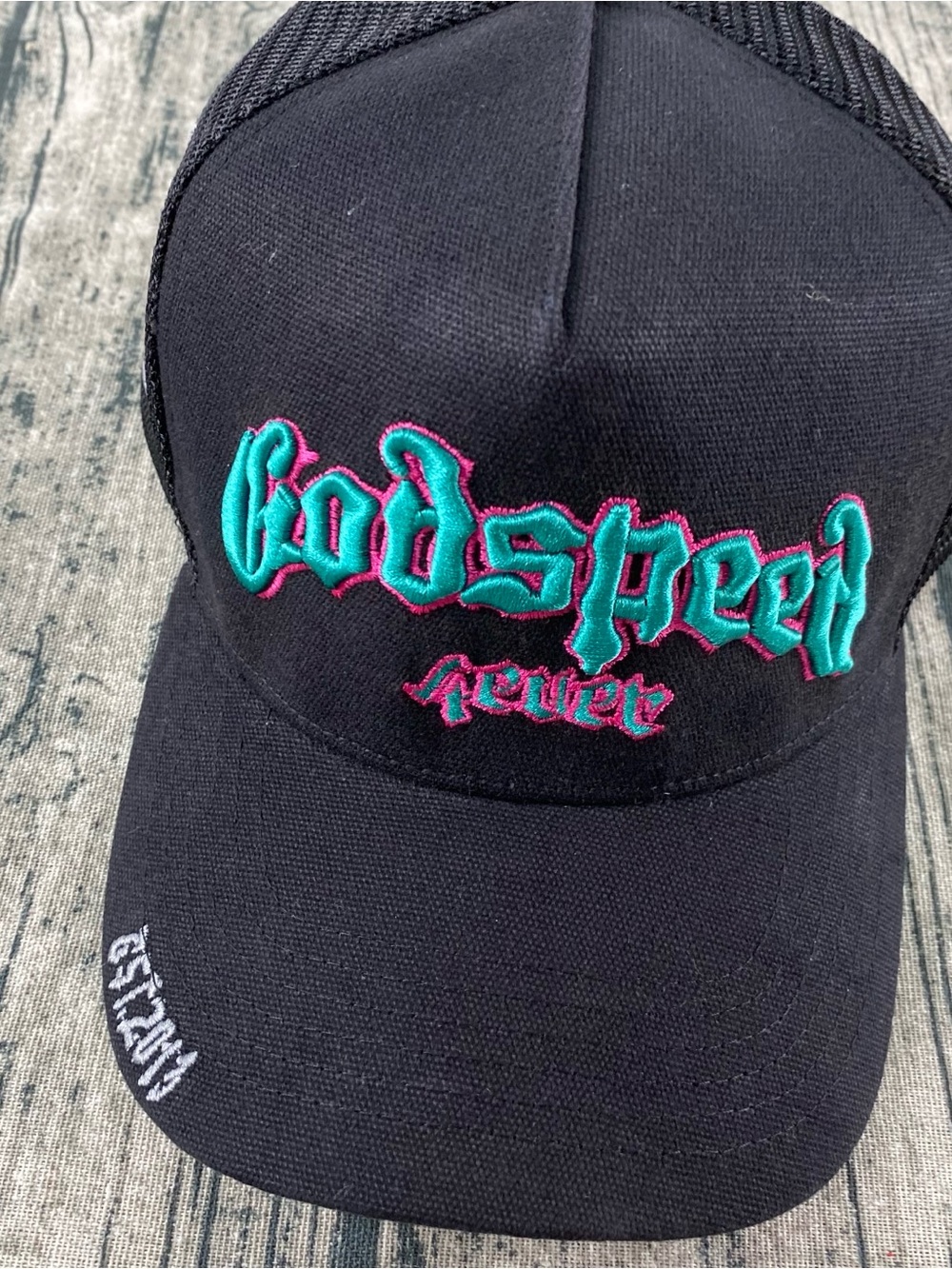 Black Trucker Cap with Teal & Pink Embroidered Logo